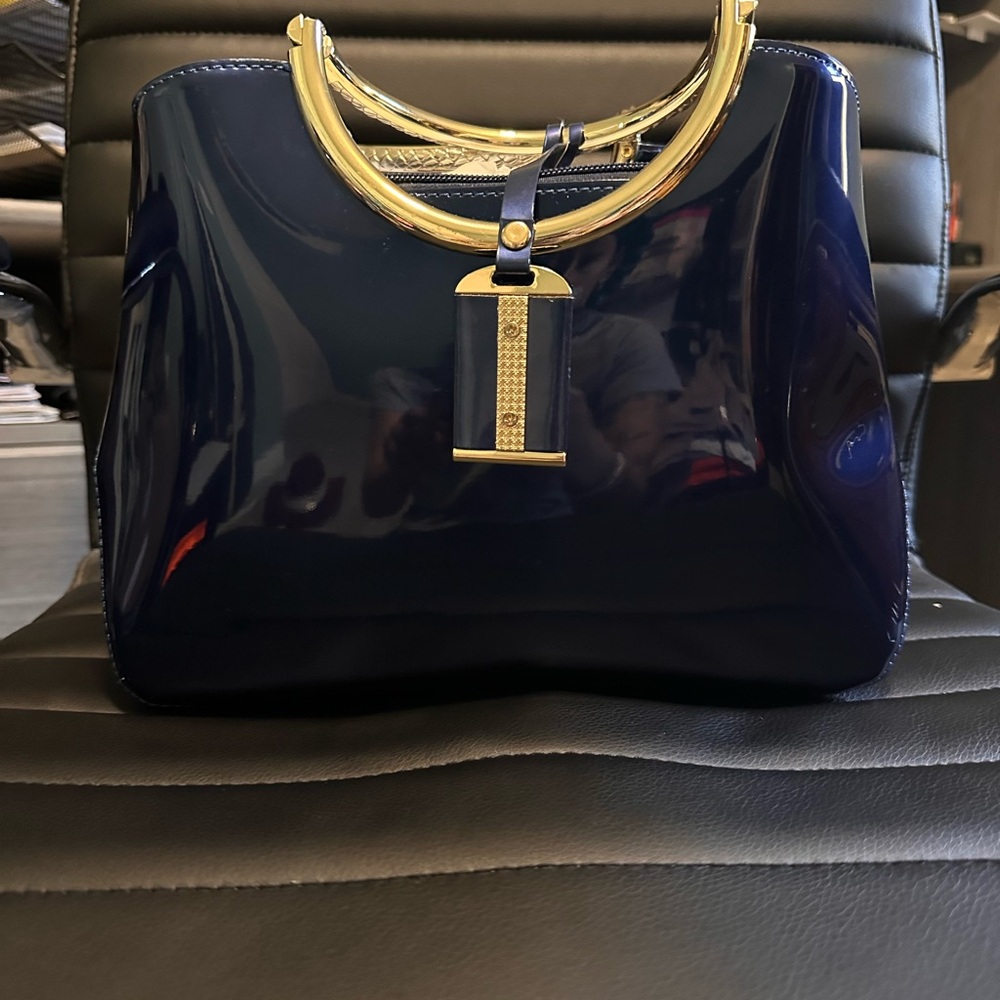 Elegant Navy Blue Handbag with Gold Accents